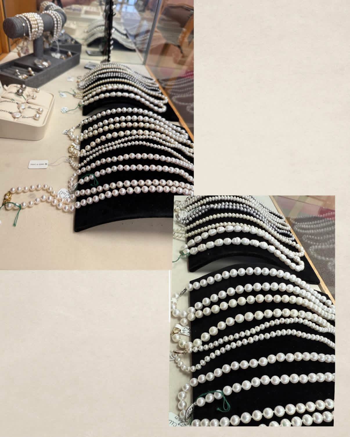 Classic pearl necklaces on display
