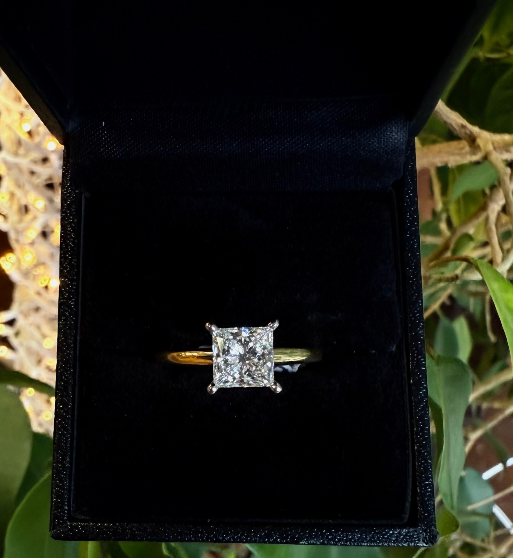 Princess-cut diamond solitaire in yellow gold