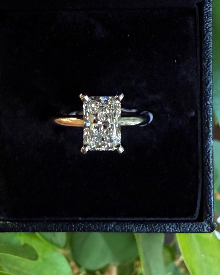 Radiant-cut diamond solitaire in yellow gold